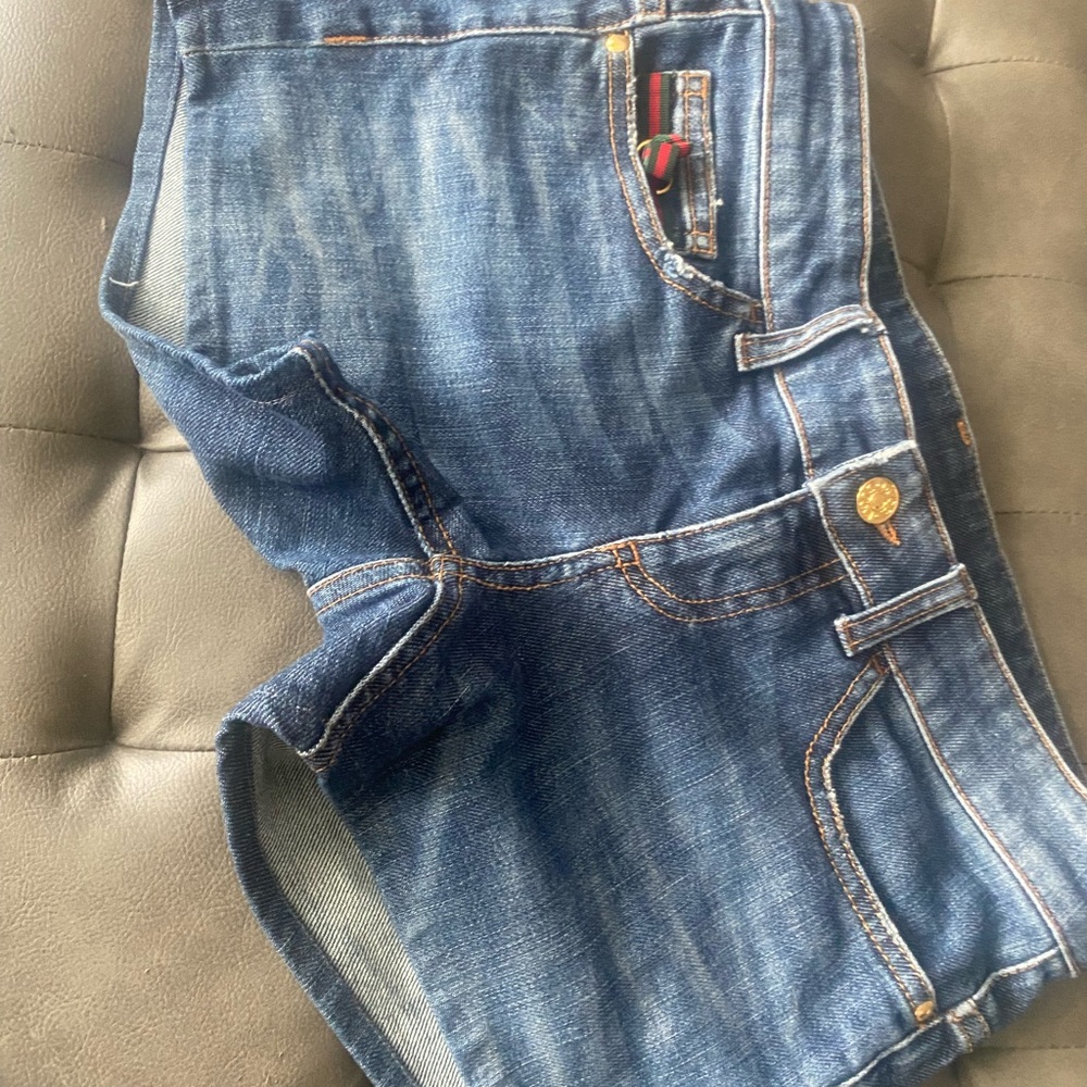 Ladies Gucci shirts size 38 slightly used